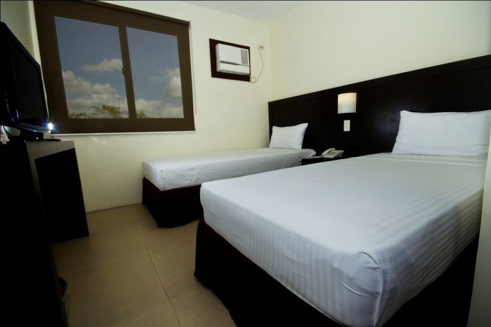 Mango Suites Тугегарао Экстерьер фото
